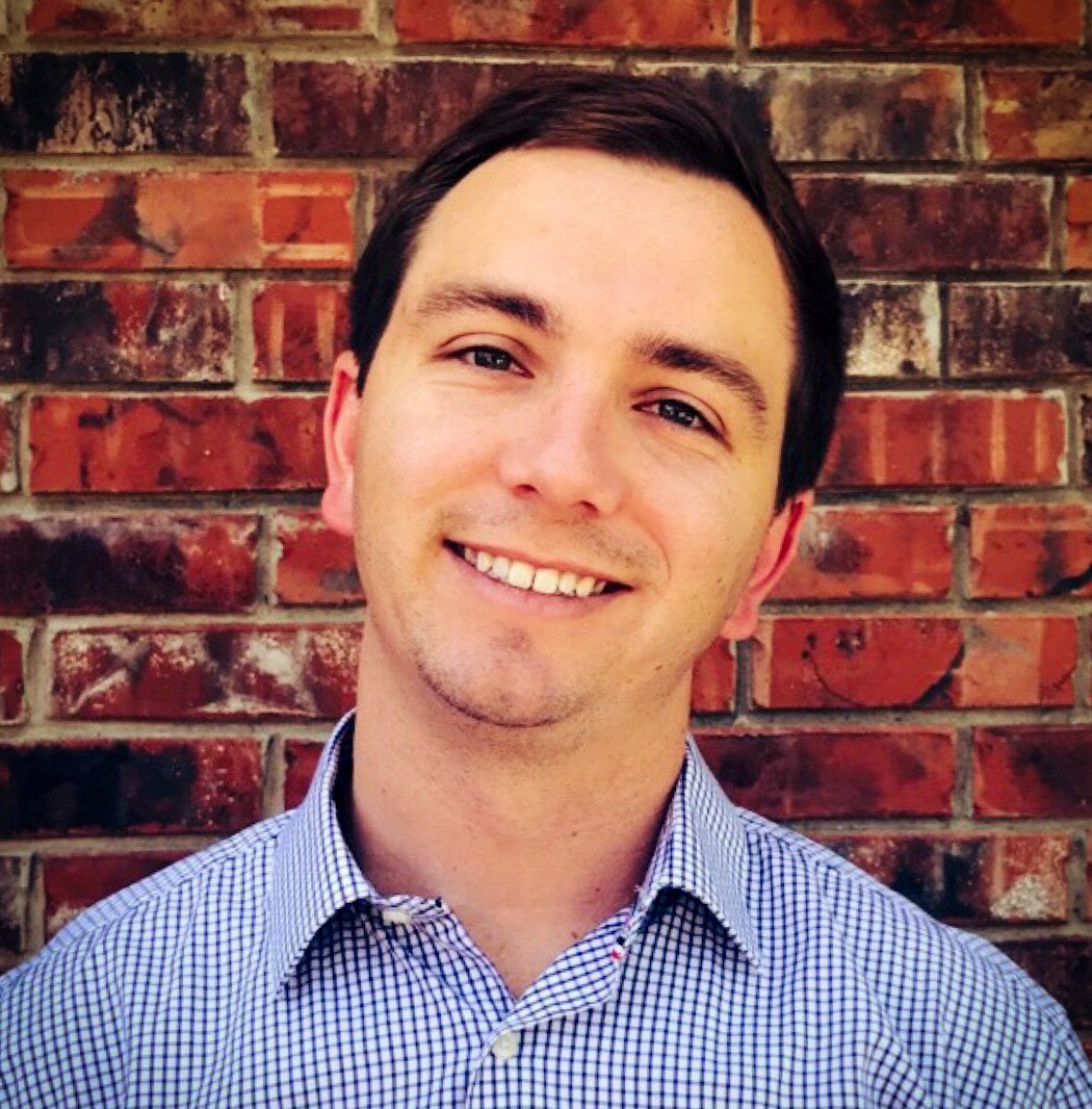 Headshot of Thad Warren